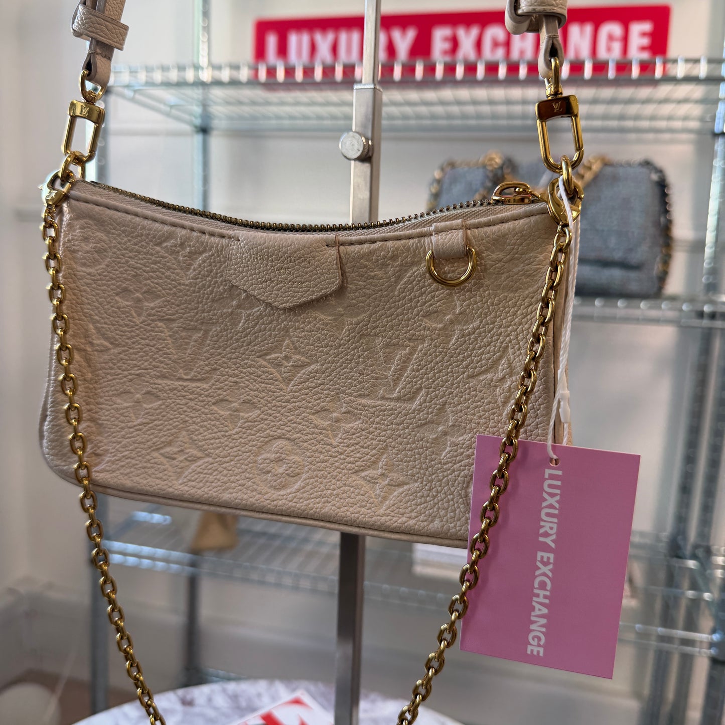 Pre-Owned White Empreinte Leather Crossbody Pochette
