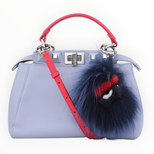 L.E. Peekaboo with Charm