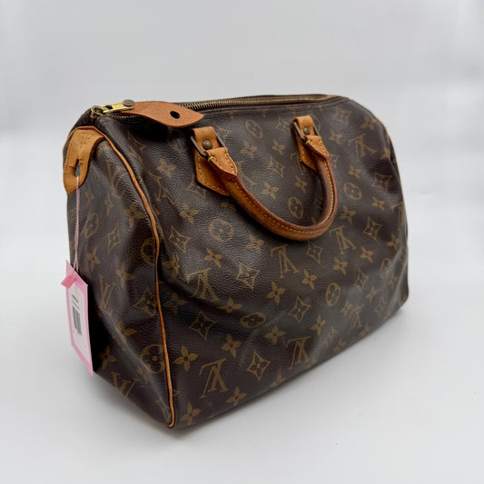 Pre-Owned Speedy