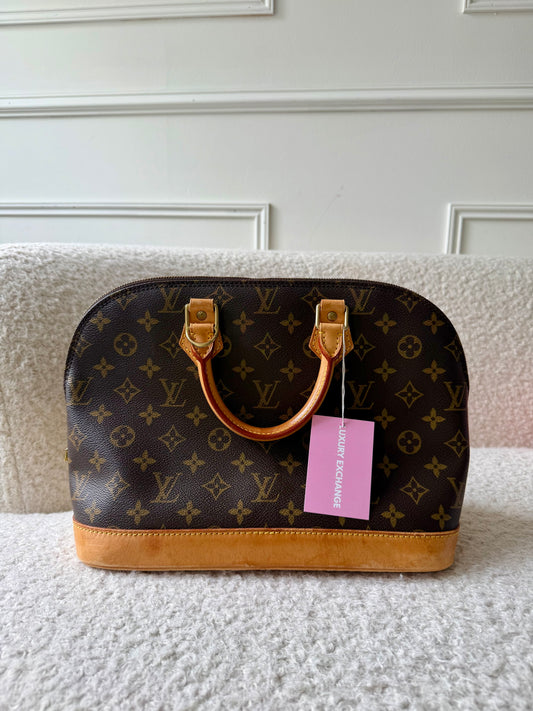 Monogram Canvas Alma PM