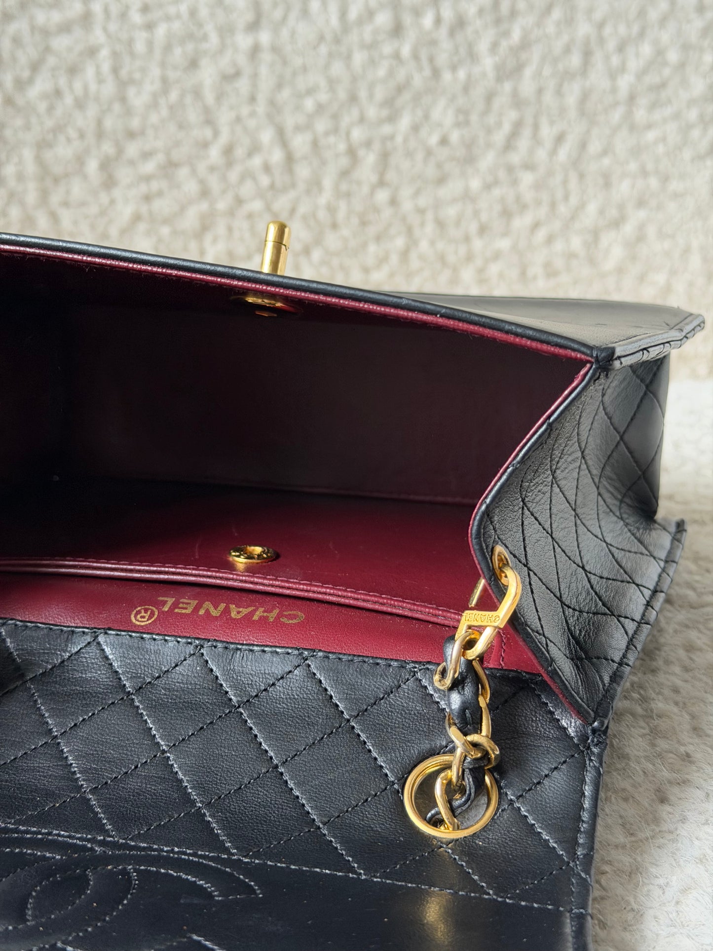 Black Lambskin Triangle Single Flap 24KGHW