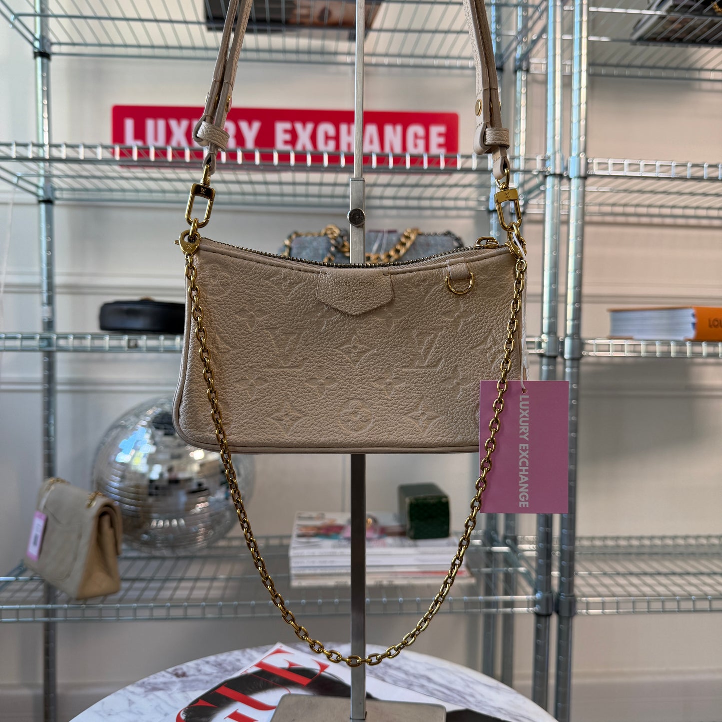 Pre-Owned White Empreinte Leather Crossbody Pochette