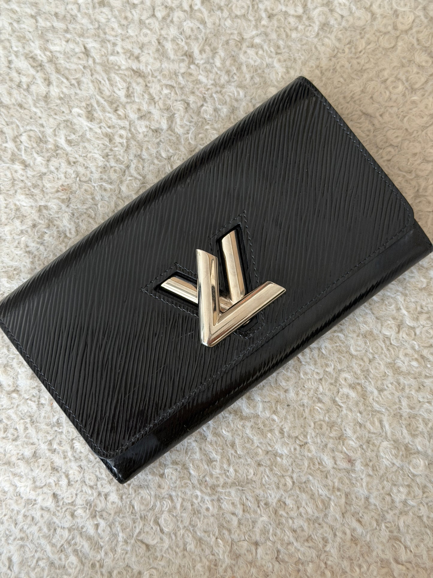 Pre-Owned Black Twist Epi Electric Leather Wallet