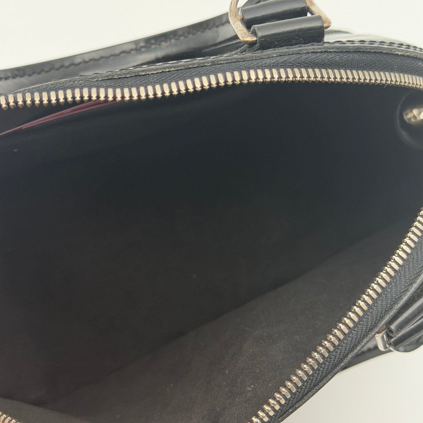 Pre-Owned Black Epi Electric Leather Alma BB Crossbody Bag